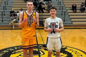 Lathrop senior Atticus Foley and Thunder Mountain senior Samuel Lockhart were selected Players of the Game after their contest on Thursday during the Wolverine Classic at South Anchorage High School. (Photo courtesy Lathrop High School)