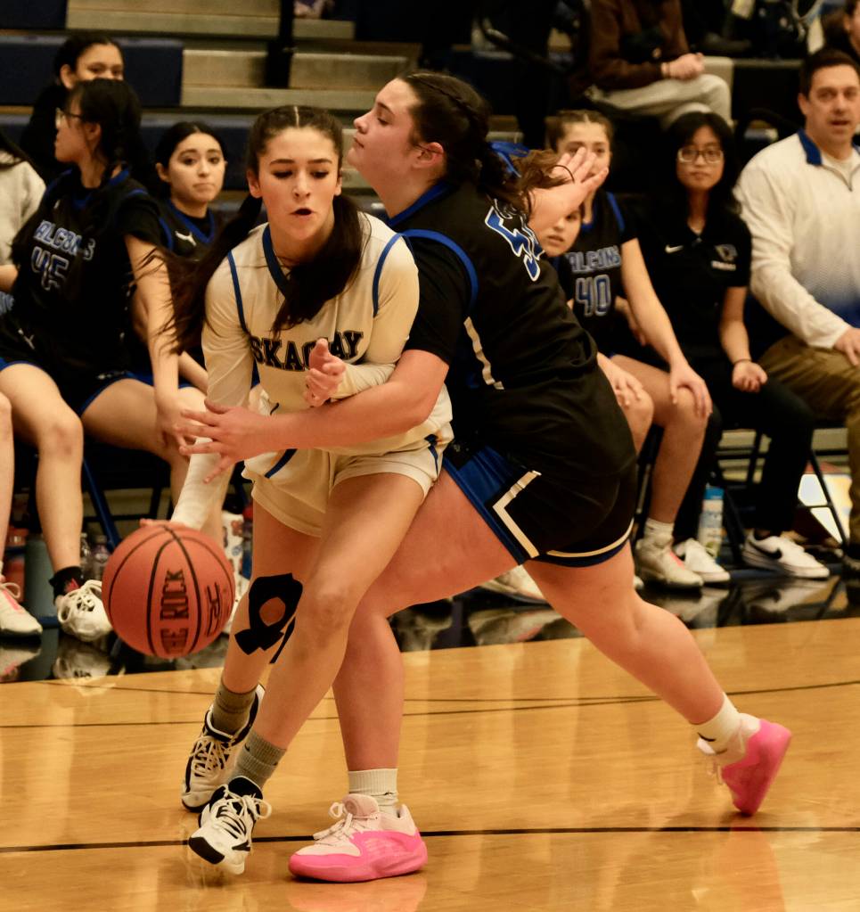 Skagways Millie Myers is fouled by a Thunder Mountain JV player during the inaugural Elizabeth Peratrovich Womens High School Basketball Invitational Tournament on Thursday at Thunder Mountain High School. The tournament runs through Saturday. (Klas Stolpe / For the Juneau Empire)
