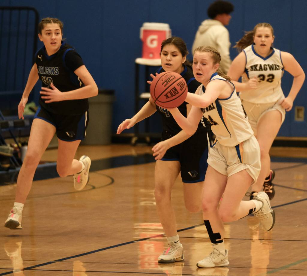 Skagways Kenadie Cox (24) steals a ball against the Thunder Mountain JV during the inaugural Elizabeth Peratrovich Womens High School Basketball Invitational Tournament on Thursday at Thunder Mountain High School. The tournament runs through Saturday. (Klas Stolpe for the Juneau Empire)