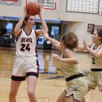 Juneau-Douglas High School: Yadaa.at Kalés Gwen Nizich (24) looks to pass against South Anchorage High School during Saturdays game at JDHS. (Mark Sabbatini / Juneau Empire)