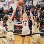 Rayna Tuckwood (4) shoots for Juneau-Douglas High School: Yadaa.at Kalé during Saturdays game against South Anchorage High School at JDHS. (Mark Sabbatini / Juneau Empire)