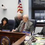 State Rep. Craig Johnson (center), an Anchorage Republican, consults with a staff member while chairing a House Rules Committee meeting at the Alaska State Capitol on Saturday to hear Senate Bill 140, which as modified by the committee makes sweeping changes to Alaskas education system. (Mark Sabbatini / Juneau Empire file photo)