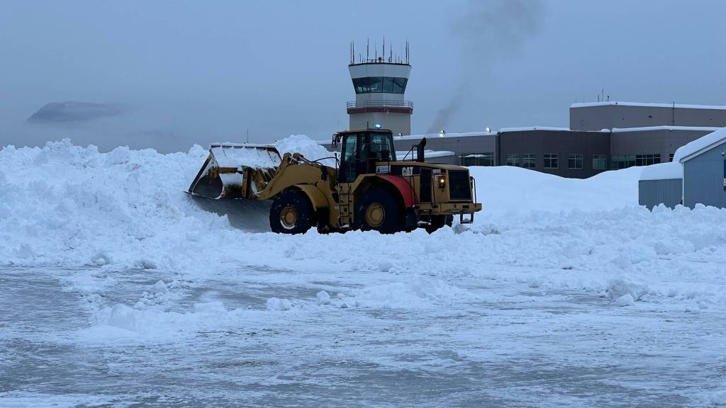 A plow clears snow at Juneau International Airport this week. (City and Borough of Juneau photo)