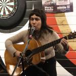 Nicole Church performs songs during a meet-and-greet for U.S. Rep. Mary Peltola at the Crystal Saloon on Saturday night. (Mark Sabbatini / Juneau Empire)