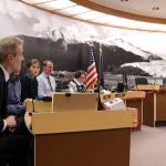 Juneau School District Superintendent Frank Hauser, left, provides an update about the districts financial situation to Juneau Assembly members and administrative leaders on Monday night at City Hall. A joint meeting of the Assembly and Juneau Board of Education to discuss possible solutions to the districts financial crisis is scheduled Tuesday night. (Mark Sabbatini / Juneau Empire)
