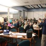 Juneau School District Superintendent Frank Hauser provides an overview of restructuring options being considered during a Community Budget Input Session at Thunder Mountain High School on Wednesday night. (Mark Sabbatini / Juneau Empire)