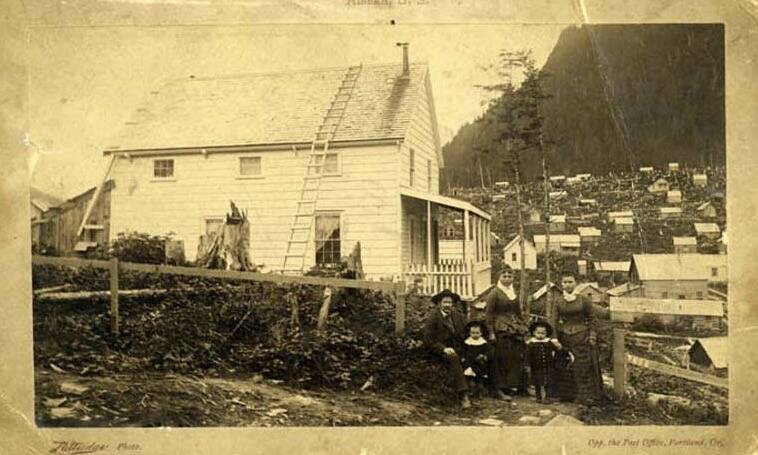 City co-founder Richard Harris is shown in this 1889 photo with his family outside his home on todays Telephone Hill. (Partridge Photo, UAA-HMC-0131)