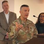 Adjutant General Torrence Saxe, head of the Alaska National Guard, speaks at a Sept. 23, 2022, news conference in Anchorage. Behind him are Gov. Mike Dunleavy and Rep. Mary Peltola. (Photo by Yereth Rosen/Alaska Beacon)