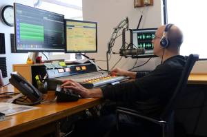 Wade Bryson answers a call during the final live episode of the KINY-AM show Problem Corner on Friday morning. The show that began about 70 years ago, making it the longest-running radio program in Alaskas history, is being replaced on weekdays with music programming after new owners purchased all of Juneaus commercial radio stations last year. A weekly podcast version of Problem Corner that is broadcast on Saturdays and available on-demand is scheduled to debut Feb. 17. (Mark Sabbatini / Juneau Empire)