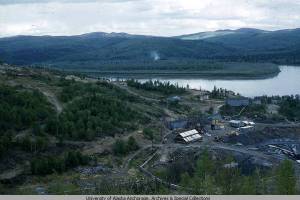 The Red Devil Mine, which produced mercury on and off from the 1930s to 1971, is seen from the air in 1960 in this archival photo from the University of Alaska Anchorages collection. The Bureau of Land Management has approved a plan to clean up what is considered the last remaining source of contamination: tailings spread over the property. (Photo by Don Grybeck/University of Alaska Anchorage Consortium Library archives and special collections)