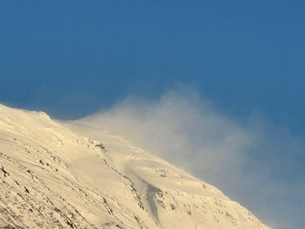 Mount Roberts smoking on Jan. 11 due to high winds. (Photo by Denise Carroll)