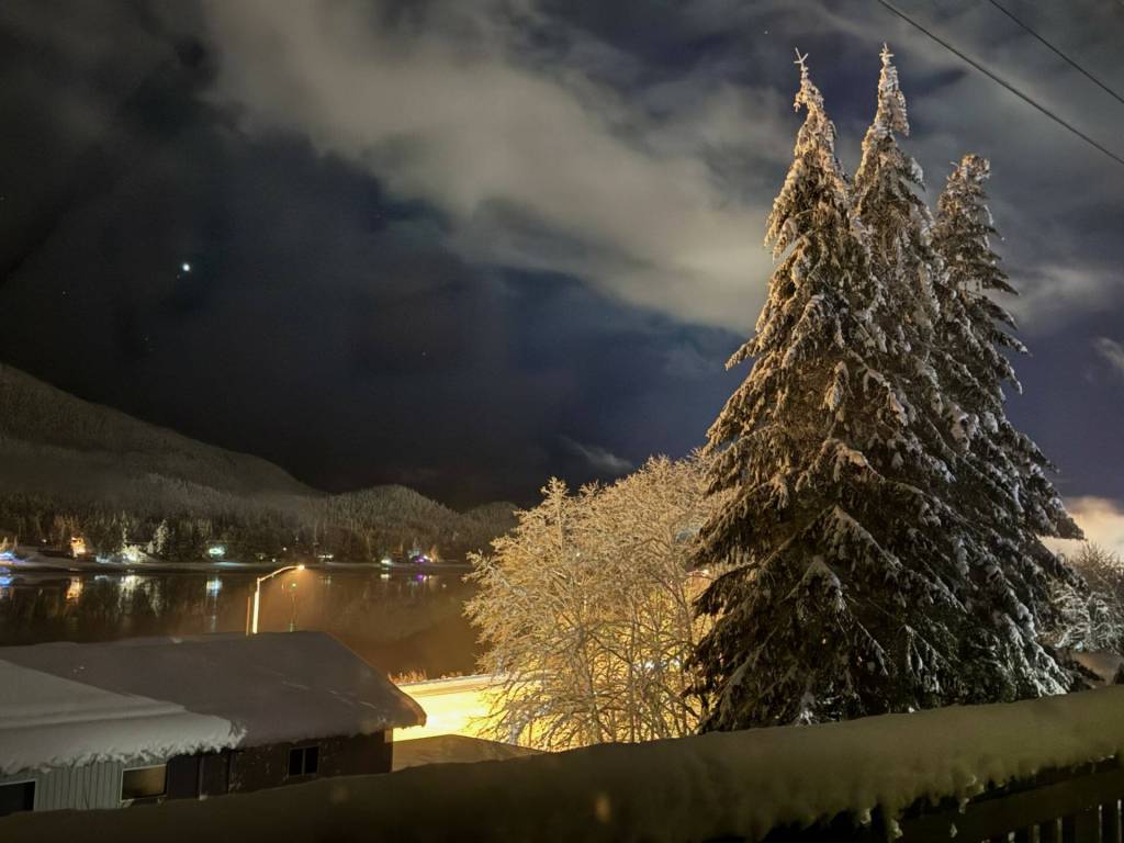 After three days of continuous snowfall the sky is cleared by midnight on Jan. 15, revealing a star in the dark blue sky. (Photo by Denise Carroll)
