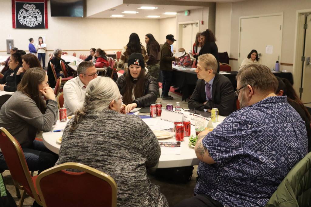 Juneau School District Superintendent Frank Hauser (second from right) listens to feedback from local Alaska Native leaders, parents and educators about proposed solutions to the Juneau School Districts financial crisis during a community conversation at Elizabeth Peratrovich Hall on Thursday night. (Mark Sabbatini / Juneau Empire)