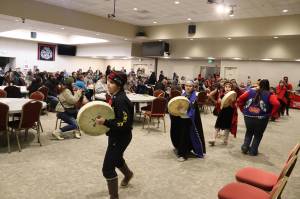 Students with the Tlingit Culture, Language and Literacy Program perform a traditional dance during a community conversation between local Alaska Native residents and municipal leaders Thursday night at Elizabeth Peratrovich Hall to discuss the Juneau School Districts budget crisis. (Mark Sabbatini / Juneau Empire)
