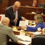Reps. Sara Hannan (right), D-Juneau, Andy Josephson (middle), D-Anchorage, and Dan Ortiz, I-Ketchikan, discuss proposed amendments to an education bill during a break in Wednesdays House floor session. (Mark Sabbatini / Juneau Empire)
