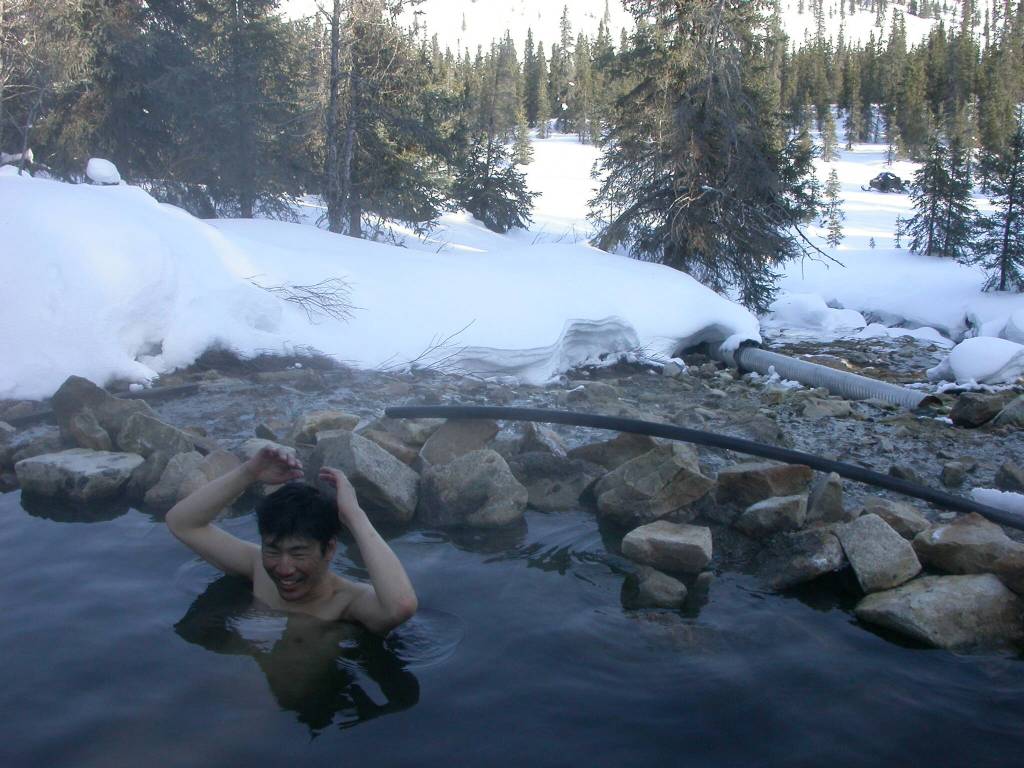 Tohru Saito soaks in Kwiniuk Hot Springs, located on the Seward Peninsula not far from the village of Elim. (Photo by Ned Rozell)