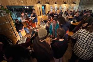 Musicians perform Sunday, Feb. 18, 2024, at Devils Club Brewing. The event was among the first three allowed under a newly amended state law. (James Brooks/Alaska Beacon)