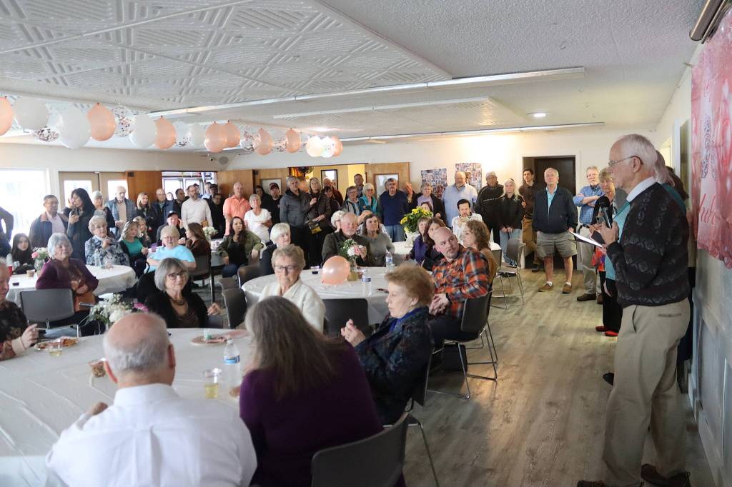 Fred Baxter offers a tribute to his mother, Jirdes Winther Baxter, before a large crowd of family, friends and dignitaries during her 100th birthday party Saturday at the Juneau Yacht Club. (Mark Sabbatini / Juneau Empire)