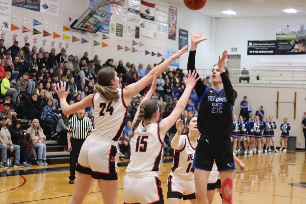 Thunder Mountain High Schools Kerra Baxter takes a shot amidst a crowd in Saturdays game against Juneau-Douglas High School: Yadaa.at Kalé at JDHS. (Mark Sabbatini / Juneau Empire)