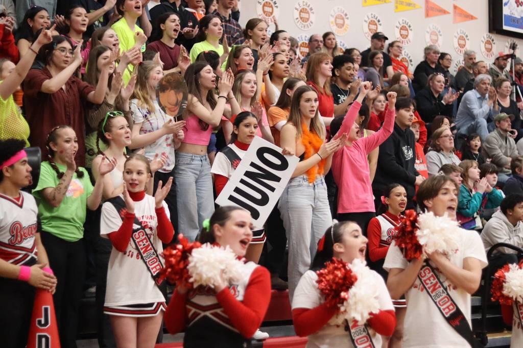 Juneau-Douglas High School: Yadaa.at Kalé students and supporters cheer for the Crimson Bears during Saturdays game against Thunder Mountain High School at JDHS. (Mark Sabbatini / Juneau Empire)