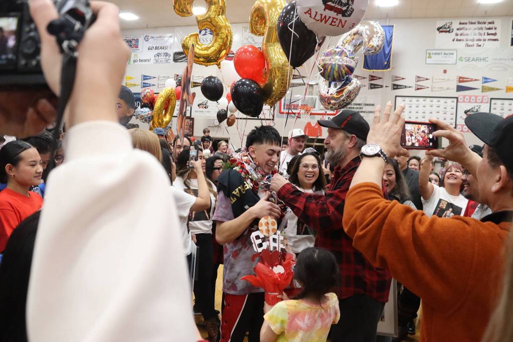 Alwen Carrillo of Juneau-Douglas High School: Yadaa.at Kalé is adorned with the traditional gifts of Senior Night by family and friends in-between the boys and girls teams of JDHS and Thunder Mountain High School at JDHS. Both JDHS teams had their senior night Saturday, the TMHS boys had theirs Friday and the TMHS girls will have theirs next Saturday in what may be the final basketball game at that school. (Mark Sabbatini / Juneau Empire)