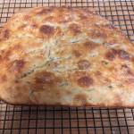 A loaf of rosemary focaccia bread fresh from the oven. (By Patty Schied)