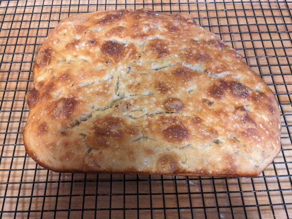 A loaf of rosemary focaccia bread fresh from the oven. (By Patty Schied)