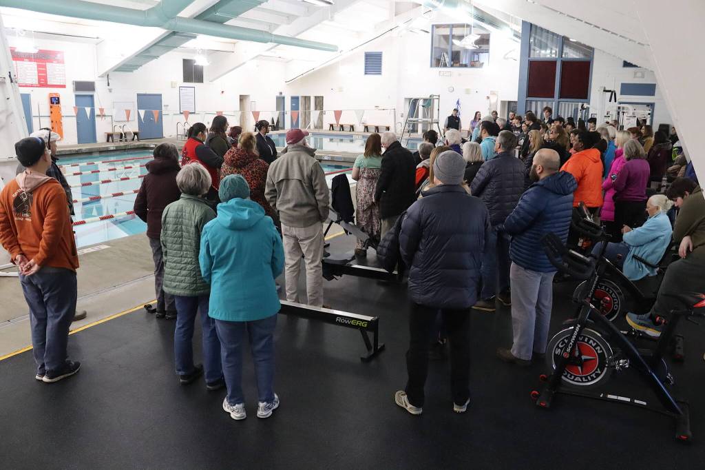 More than 50 people gather at the side of the main pool during Fridays ceremonial opening of the Augustus G. Brown Swimming Pool. (Mark Sabbatini / Juneau Empire)