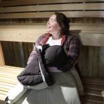 Assembly member Alicia Hughes-Skandijs sits in the sauna of the renovated Augustus G. Brown Swimming Pool during Fridays ribbon-cutting ceremony. (Mark Sabbatini / Juneau Empire)