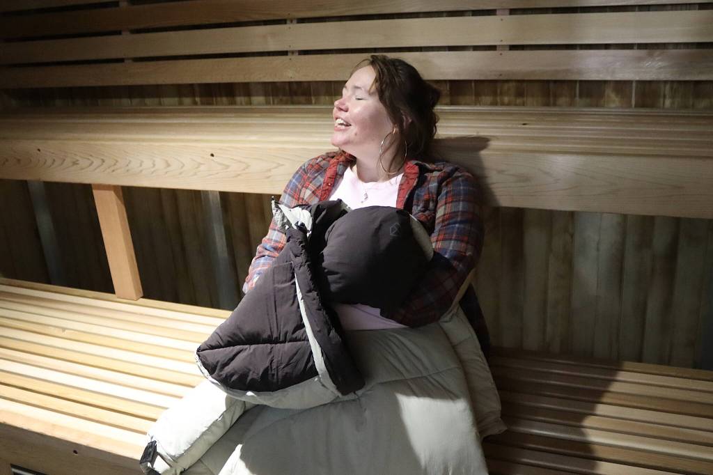 Assembly member Alicia Hughes-Skandijs sits in the sauna of the renovated Augustus G. Brown Swimming Pool during Fridays ribbon-cutting ceremony. (Mark Sabbatini / Juneau Empire)