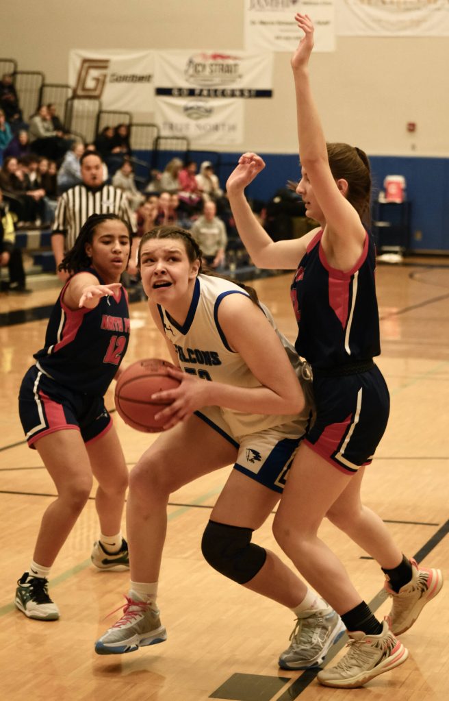 Thunder Mountain High School senior Olivia Mills looks to shoot against North Pole. (Klas Stolpe / For the Juneau Empire)