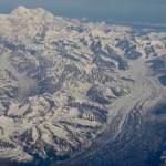 Denali, at 20,310 feet the highest mountain in North America, rises in central Alaska as seen from an airline flight from Fairbanks to Anchorage. (Photo by Ned Rozell)