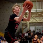Juneau-Douglas High School: Yadaa.at Kalé senior Sean Oliver shoots against Thunder Mountain during the boys championship game of the Alaska Airlines Region V 4A Basketball Tournament on Friday at Mt. Edgecumbe High Schools B.J. McGillis Gymnasium in Sitka. (James Poulson/Daily Sitka Sentinel)