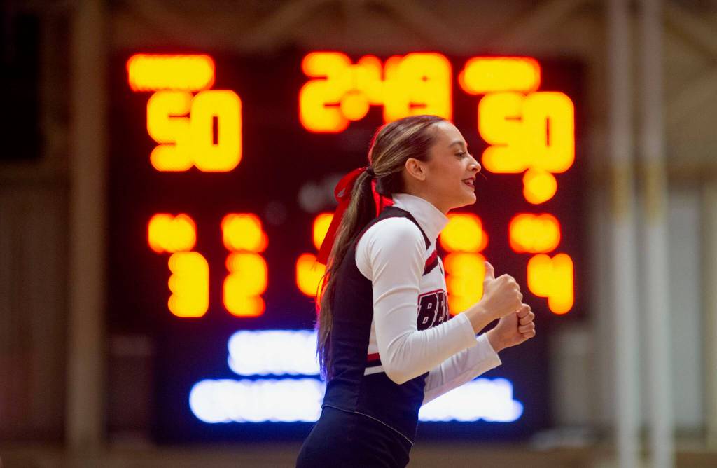 A Juneau-Douglas High School: Yadaa.at Kalé cheerleader during the boys championship game of the Alaska Airlines Region V 4A Basketball Tournament on Friday at Mt. Edgecumbe High Schools B.J. McGillis Gymnasium in Sitka. (James Poulson/Daily Sitka Sentinel)