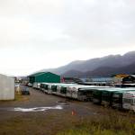 A city-owned warehouse, at left, being used as a cold-weather emergency shelter has had a generally successful first season, but there are concerns about staff safety and illegal activity such as break-ins at nearby businesses including a tour bus company, according to a report presented to Juneau Assembly members Monday. (Mark Sabbatini / Juneau Empire file photo)