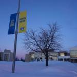 Sunset hues color the sky and the snow at the University of Alaska Fairbanks campus on Feb. 26. Enrollment in the University of Alaska system is growing, as are research programs, notably the Arctic-focused programs for which UAF is famous, said University of Alaska President Pat Pitney. (Yereth Rosen/Alaska Beacon)