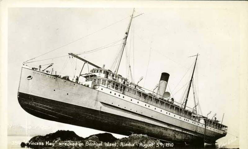In 1910 the Princess May ran aground near Sentinel Island despite its lighthouse. All aboard survived, as did the ship. (UAA-HMC-0428)