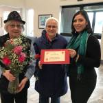 Local AARP members deliver roses to the Riverview Senior Living complex during Wish of a Lifetimes 11th Annual Cupid Crew. (Photo courtesy of Linda Kruger / AARP)