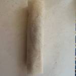A prepared spring roll ready for frying. (Photo by Patty Schied)