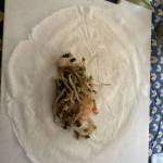 Filling a spring roll in preparation for frying. (Photo by Patty Schied)
Filling a spring roll in preparation for frying. (Photo by Patty Schied)