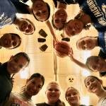 The Thunder Mountain High School Falcons Region V champion girls basketball team pose for a photo during practice at the Thunderdome on Friday. The Falcons begin state tournament play Wednesday at Anchorages Alaska Airlines Center. (Klas Stolpe / For the Juneau Empire)