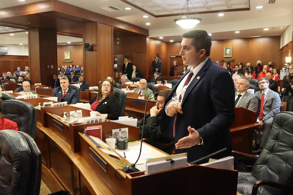 Rep. Justin Ruffridge, a Soldotna Republican who co-chairs the House Education Committee, speaks in favor overriding a veto of Senate Bill 140 during floor debate of a joint session of the Alaska State Legislature on Monday. (Mark Sabbatini / Juneau Empire)