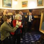 Legislators and other guests view a newly unveiled portrait of the late Congressman Don Young on Monday, the second anniversary of his death, to be in the Alaska State Capitol. (Mark Sabbatini / Juneau Empire)