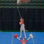 The Juneau-Douglas High School: Yadaa.at Kalé Crimson Bears cheer team at the 2024 ASAA/First National Bank Alaska Cheer State Championships at the Alaska Airlines Center in Anchorage. (Klas Stolpe, For the Juneau Empire)
