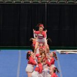 The Juneau-Douglas High School: Yadaa.at Kalé Crimson Bears cheer team at the 2024 ASAA/First National Bank Alaska Cheer State Championships at the Alaska Airlines Center in Anchorage. (Klas Stolpe, For the Juneau Empire)
