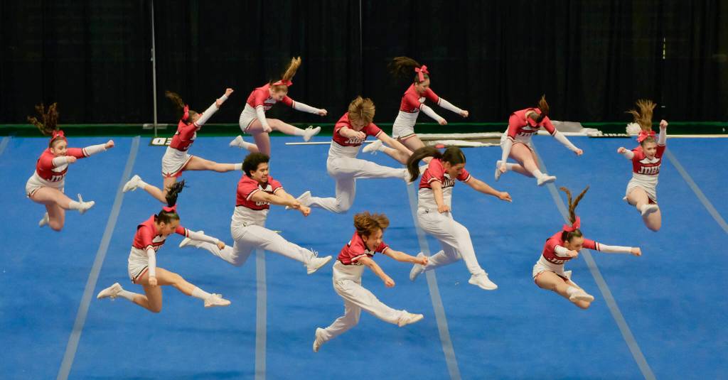 The Juneau-Douglas High School: Yadaa.at Kalé Crimson Bears cheer team at the 2024 ASAA/First National Bank Alaska Cheer State Championships at the Alaska Airlines Center in Anchorage. (Klas Stolpe, For the Juneau Empire)