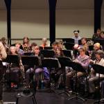 Mike Bucy, Dzantiki Heeni Middle Schools band teacher, conducts an ensemble of Taku Winds and DHMS band students during a rehearsal for a concert Saturday at Thunder Mountain High School. (Photo courtesy of Juneau Community Bands)