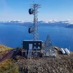 A broadband tower on a mountaintop that is part of a network providing service to rural Alaska communities. (Cordova Telecom photo provided by the U.S. Department of Agriculture)
