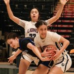 Thunder Mountain High School junior Kerra Baxter battles for a ball with Mountain City senior Morgan Maldonado and sophomore Jasmine Schaeffer (23) during the Falcons 52-37 loss to the Lions in the 3rd/5th-place game of the 2024 ASAA March Madness Alaska 4A Girls Basketball State Championships on Saturday at Anchorages Alaska Airlines Center. (Klas Stolpe / For the Juneau Empire)