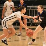 Thunder Mountain High School senior Jenna Dobson (5) defends Mountain City senior Morgan Maldonado during the Falcons 52-37 loss to the Lions in the 3rd/5th-place game of the 2024 ASAA March Madness Alaska 4A Girls Basketball State Championships on Saturday at Anchorages Alaska Airlines Center. (Klas Stolpe / For the Juneau Empire)